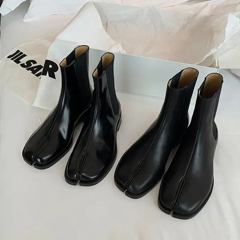 Two pairs of Women’s Retro Split Toe Ankle Boots in Black Leather with split toes.