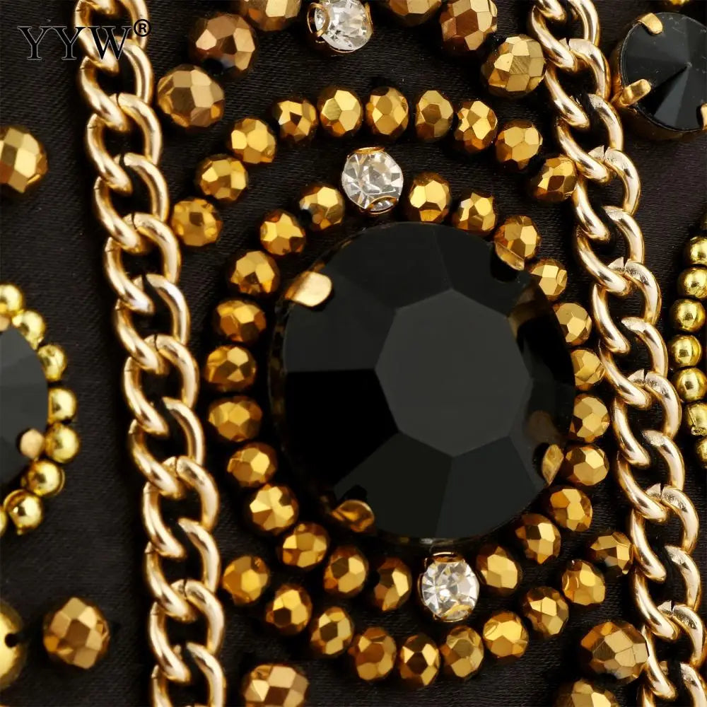 Gold chain and crystal beadwork on Bohemia Style Rhinestone Cocktail Clutch in Black Satin.