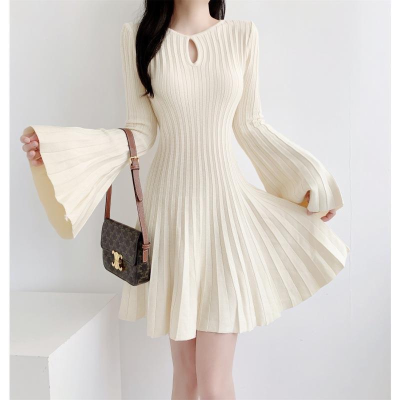 Ladies Bat Wing knitted dress with cinched waist and slimming A-line pleats