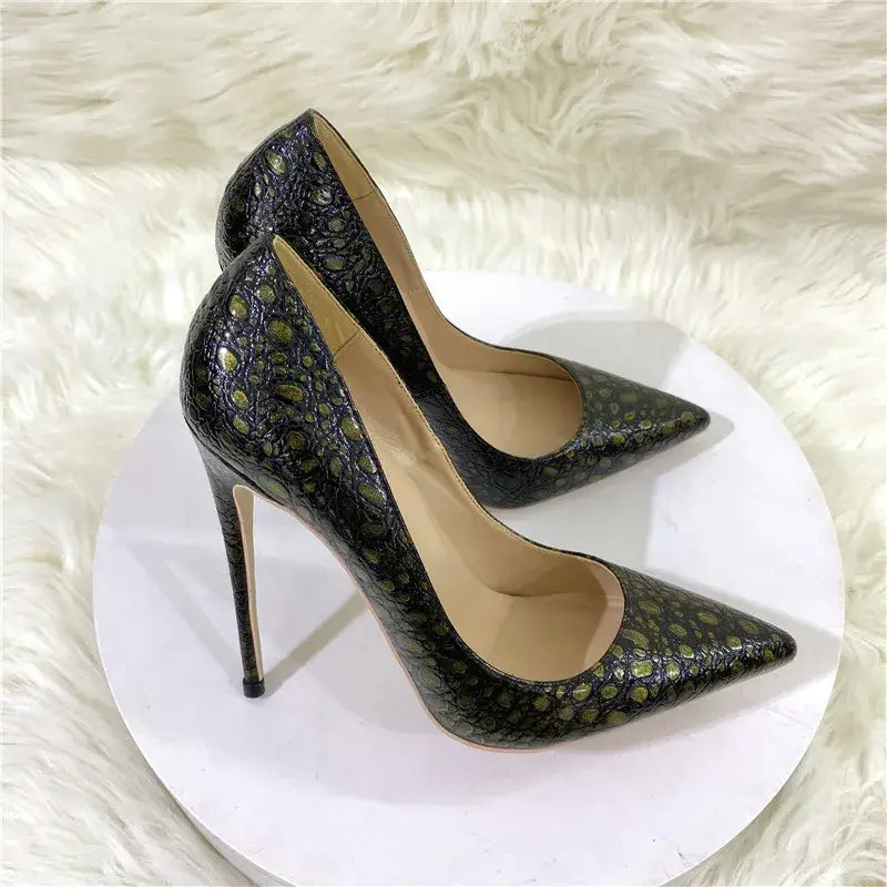 Stylish black snakeskin stiletto pumps perfect for high heel party vibes with pointed toe.