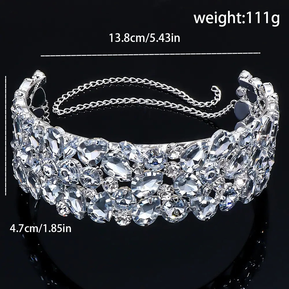 Exaggerated Water Diamond choker necklace with ornate tiara and crystal floral gems.