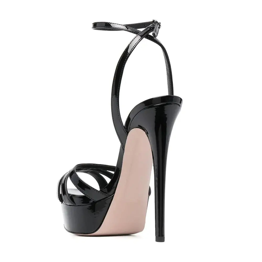 Black patent leather platform sandals with ankle buckle and slim heels for stylish vibes