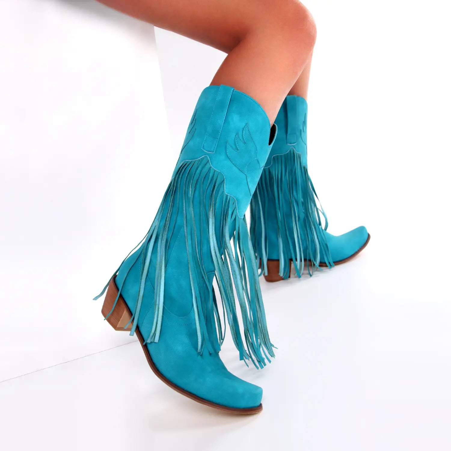 Turquoise suede womens cowboy boots with cool tassel fringe detail on the sides.