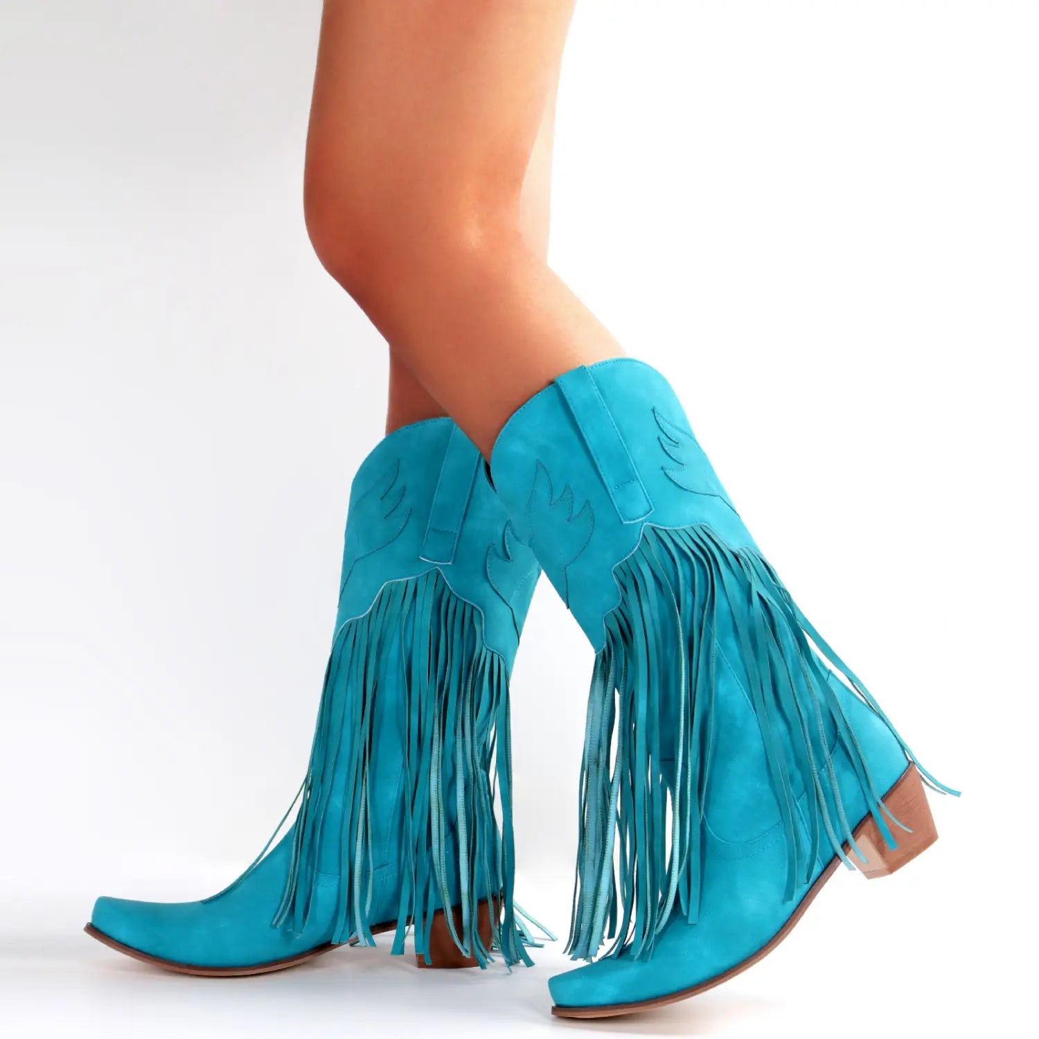 Turquoise suede womens cowboy boots with fringe tassels for a trendy look.