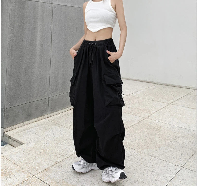 Women's black wide and baggy leg cargo pants with high waist