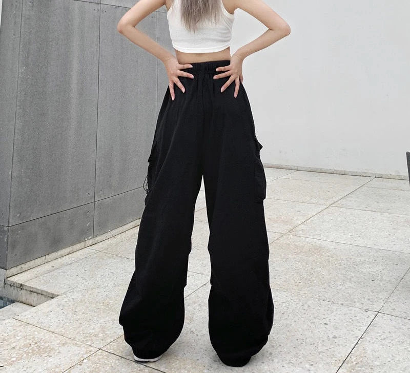 Women's black wide and baggy leg cargo pants with high waist