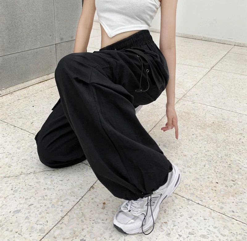 Women's black wide and baggy leg cargo pants with high waist