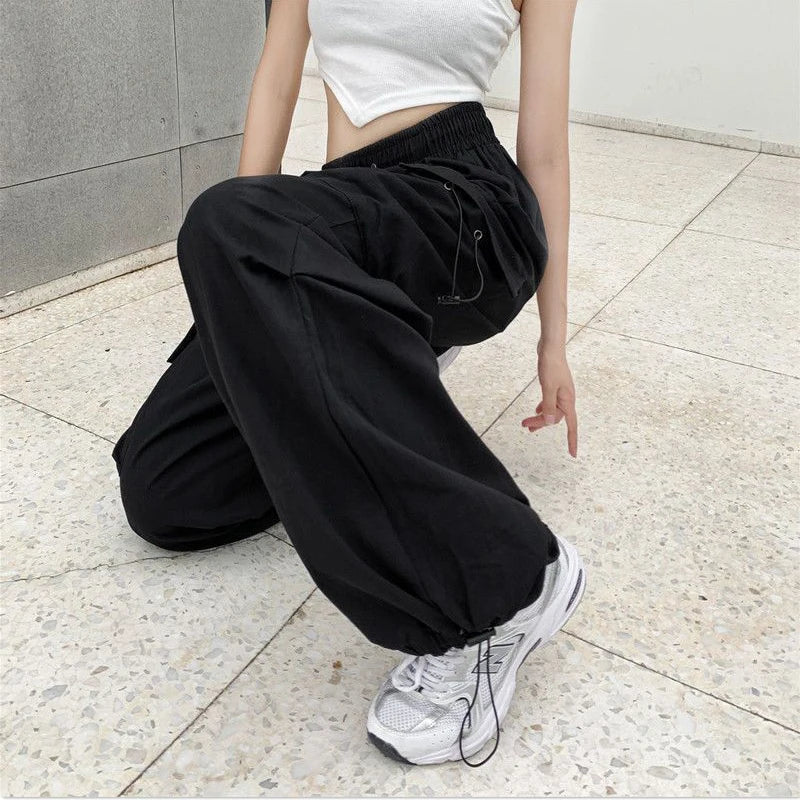 Women's black wide and baggy leg cargo pants with high waist