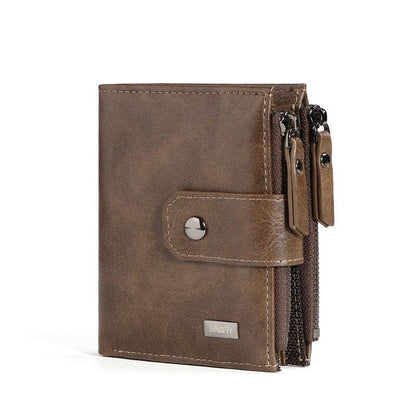 Brown leather wallet with multiple zippered compartments and a snap closure.