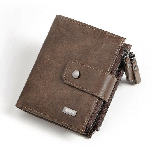 Brown leather wallet with a snap closure and zipper compartment.