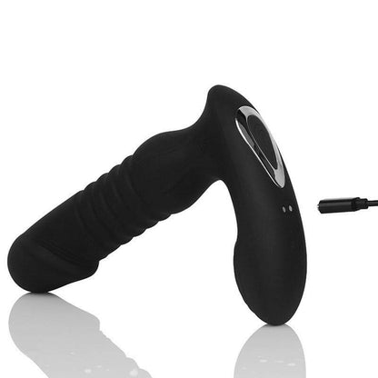 Black silicone personal massager with ergonomic shape and charging cable.