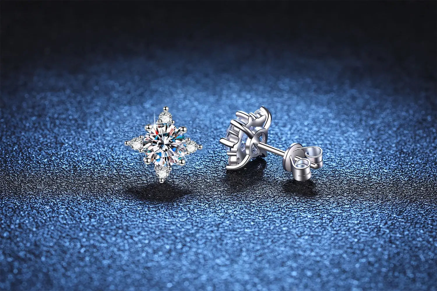 Stunning Snowflake Moissanite Diamond sterling silver four-claw stud earrings.