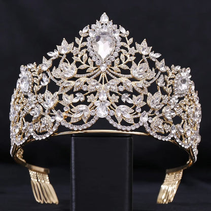 Ornate diamond-encrusted tiara with intricate floral and leaf designs.