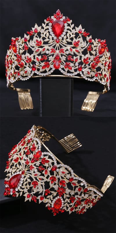 Ornate tiara with red gemstones and intricate metalwork design.