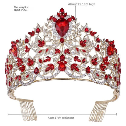 Ornate tiara featuring red gemstones and diamonds in an intricate floral design.