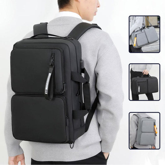 Black multi-compartment backpack with padded straps and multiple pockets.