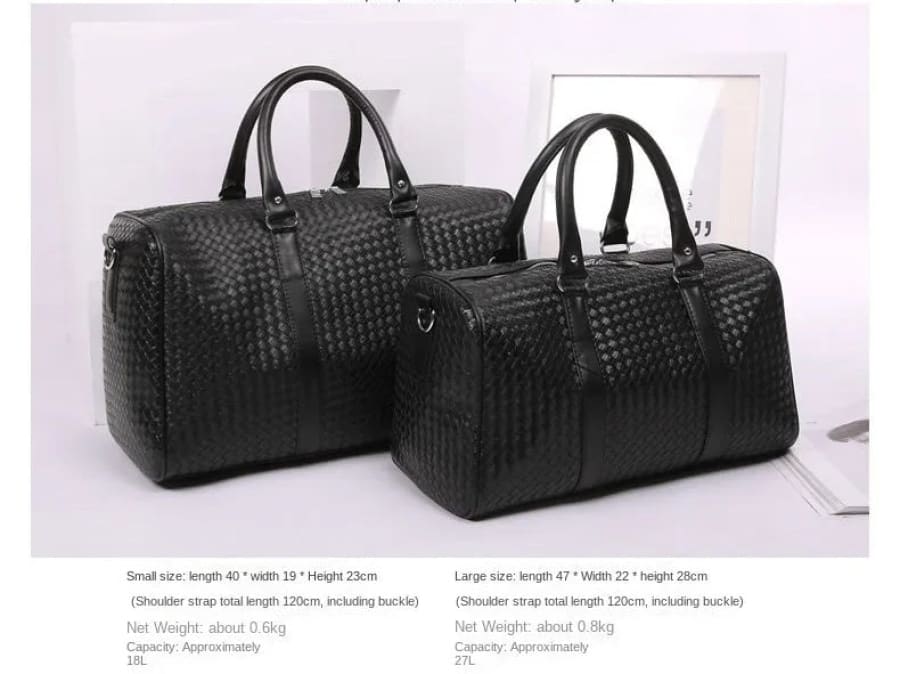 Two black leather duffle bags with woven texture and handles.