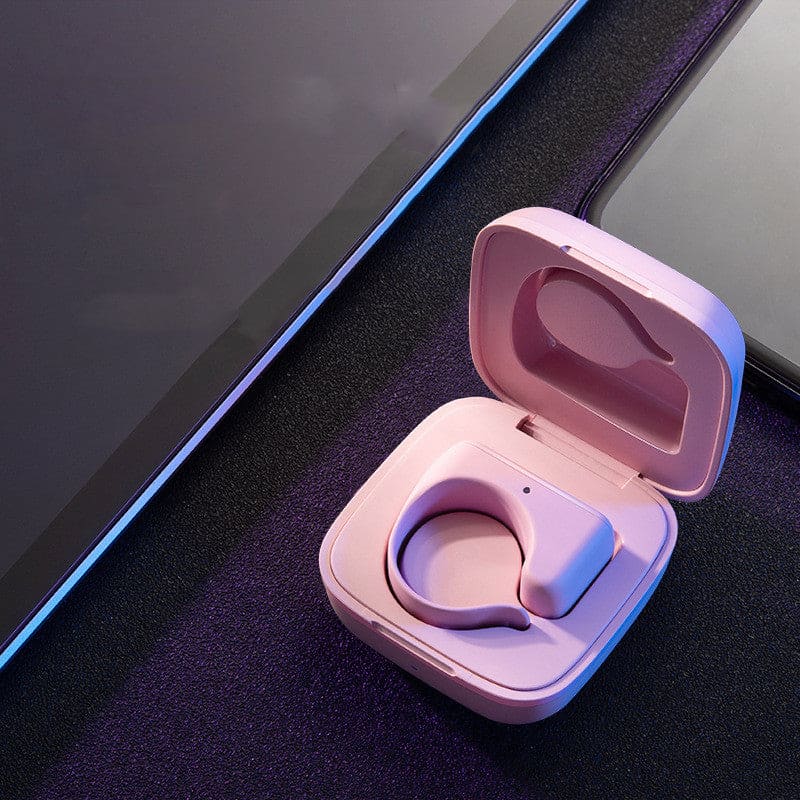 Pink wireless earbud in an open charging case.