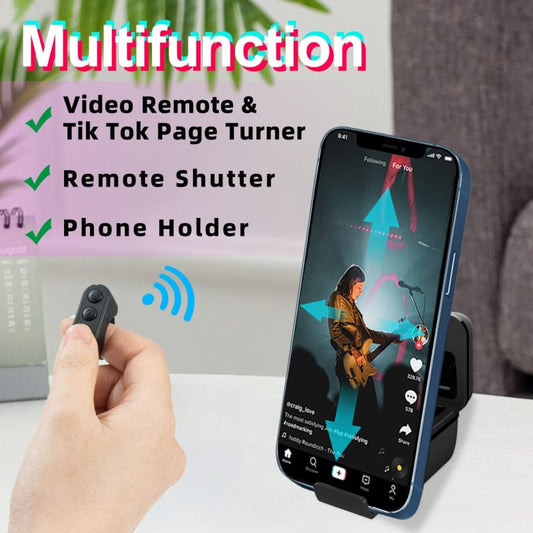 Multifunction smartphone accessory combining a remote control, TikTok page turner, shutter release, and phone stand.