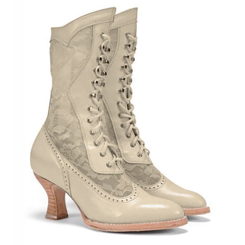 Pair of vintage-style lace-up boots with a curved heel and decorative perforations.