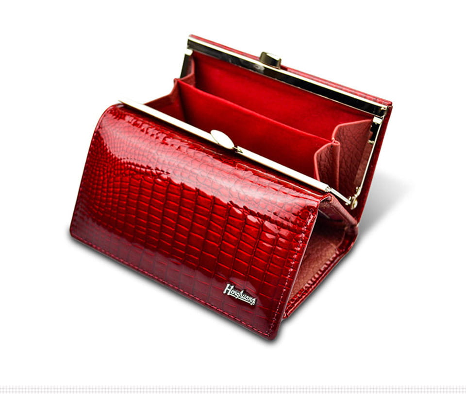 Wine Red Patent Leather Crocodile print purse with textured finish and gold clasp.