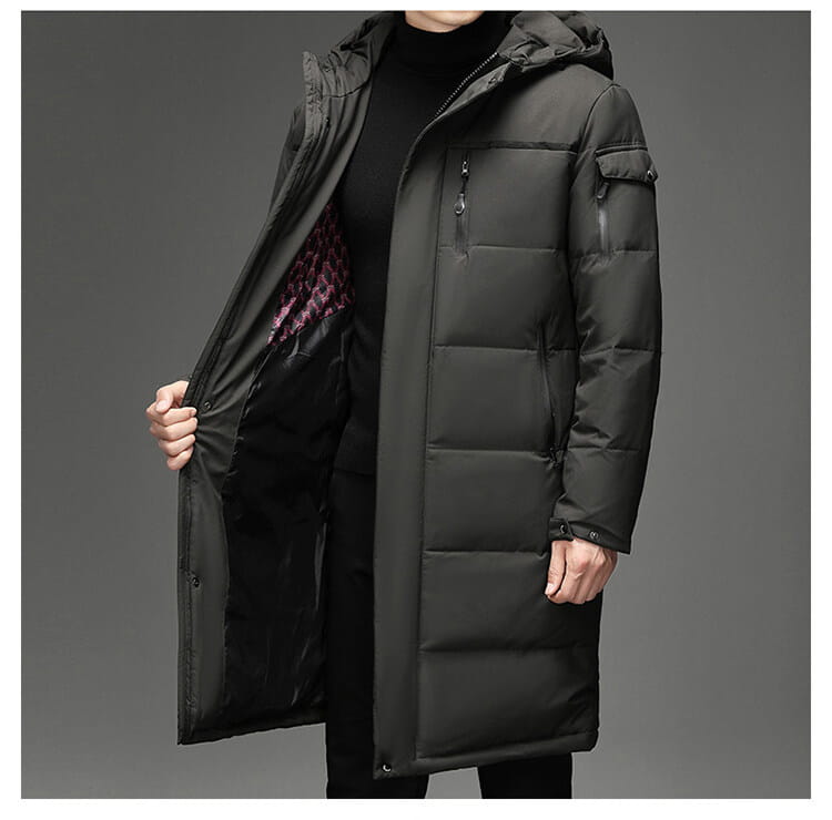 Long black quilted knee length coat with thermal insulation for cold days.