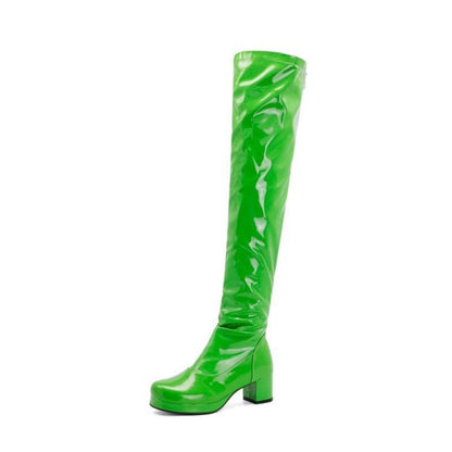 Bright green patent leather knee-high boot with a chunky heel.