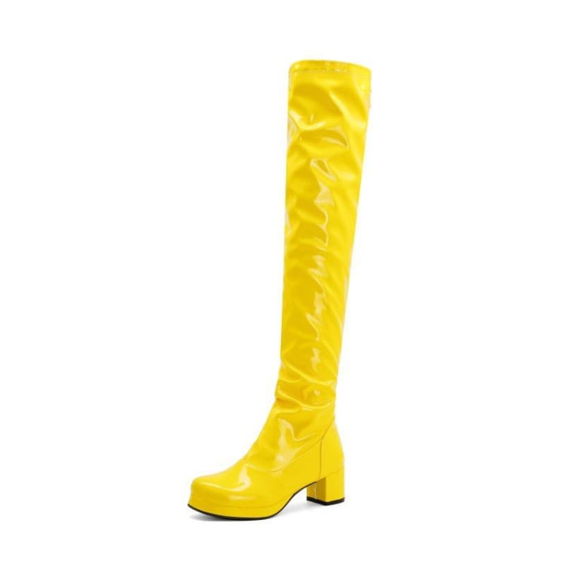 Bright yellow knee-high boot with a chunky heel.