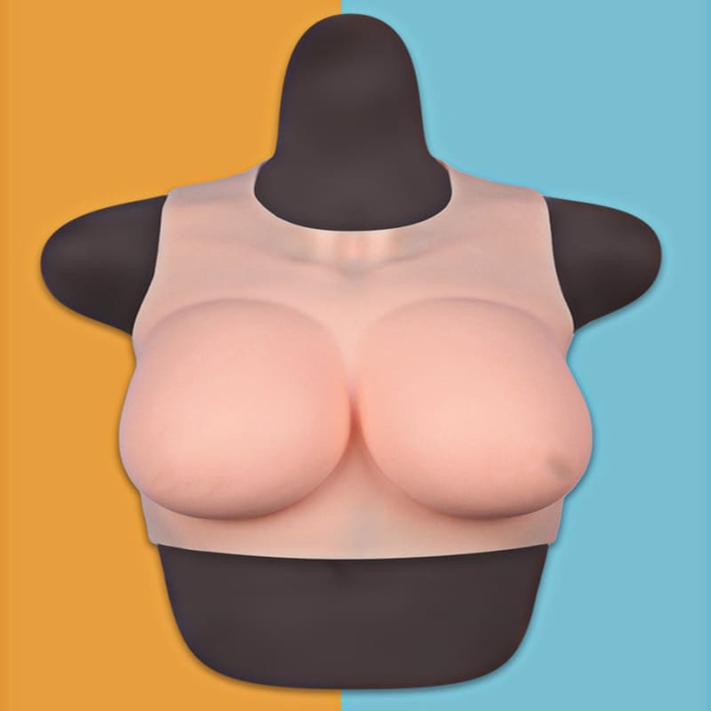 Mannequin torso with prominent breasts wearing a light-colored top.