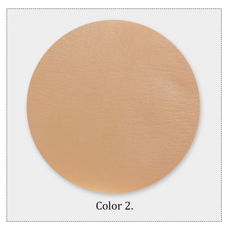 Circular swatch of light beige or tan color.