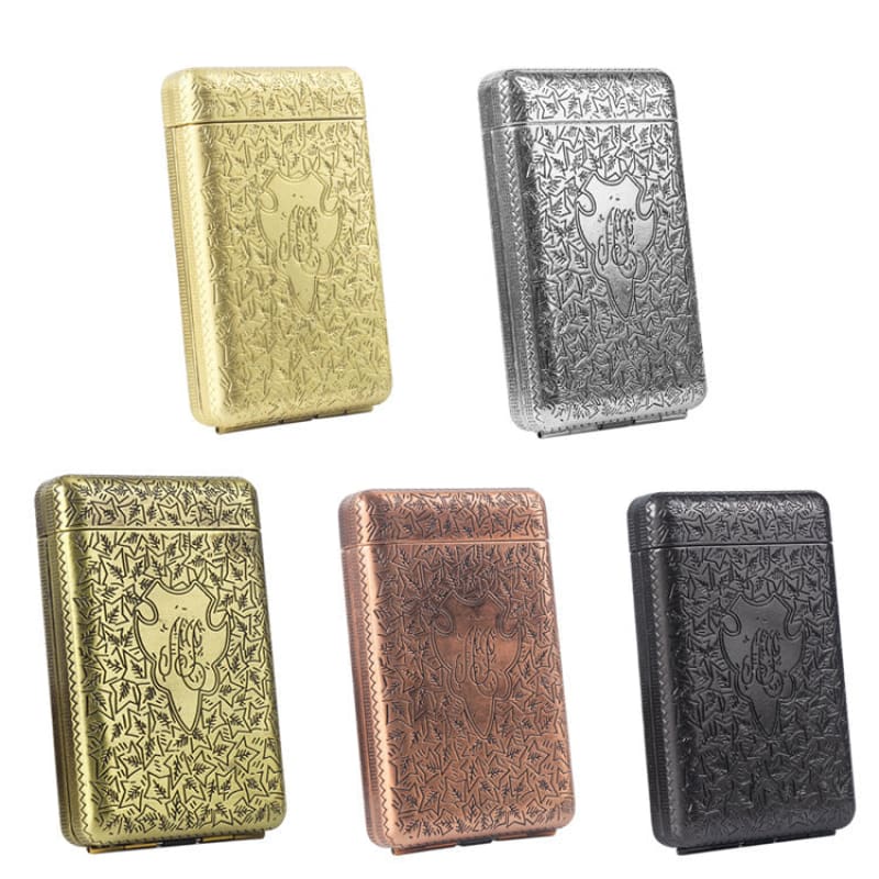 Ornate metal cigarette cases in various metallic colors with embossed floral designs.