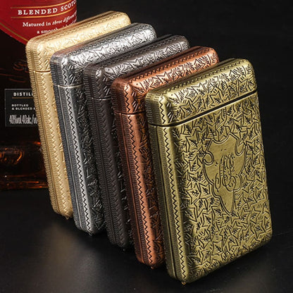 Ornate metal cigarette cases in various metallic colors with embossed floral patterns.