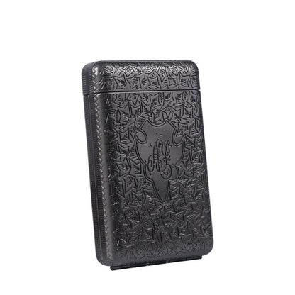 Black leather wallet or card holder with intricate embossed design featuring a skull motif.