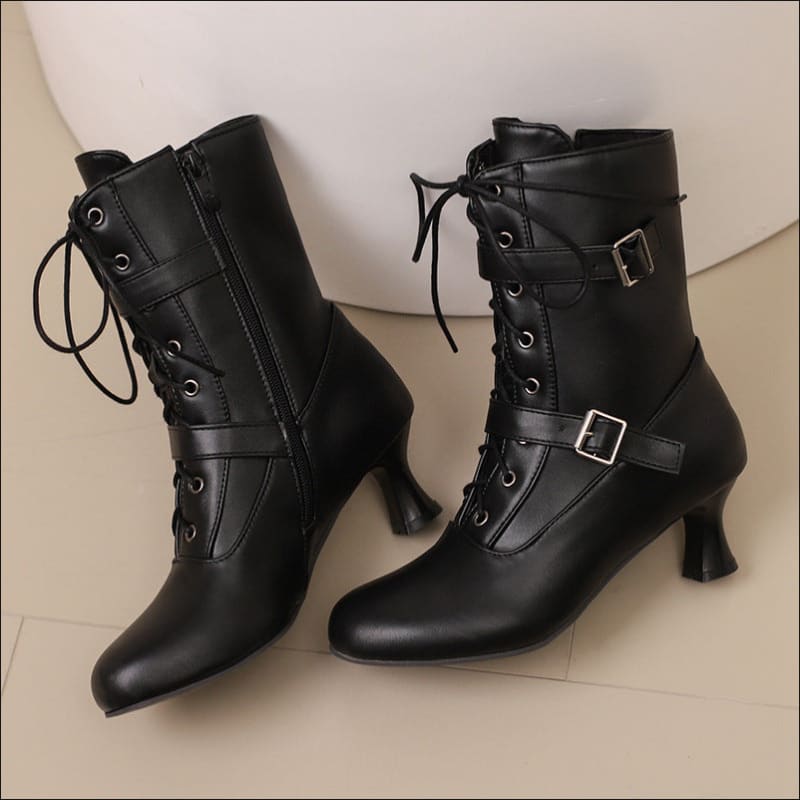 Black leather Victorian-style mid heel lace-up boots for stylish Steampunk vibes.