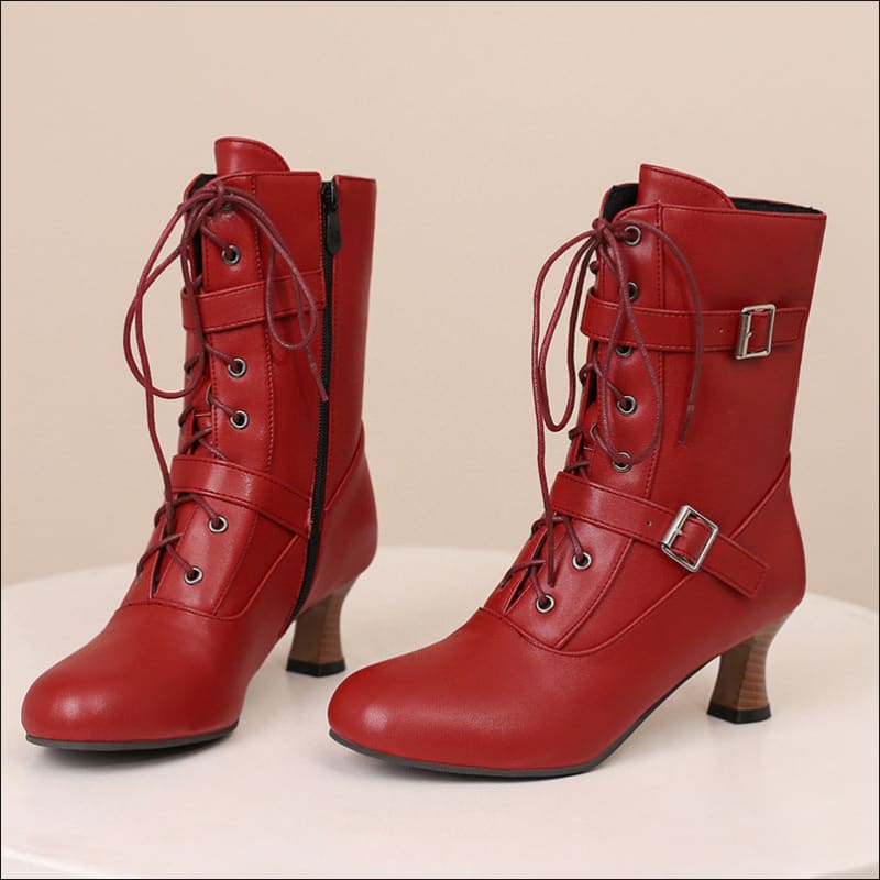 Red leather Victorian lace-up boots with mid heel and steampunk vibe for trendy style.