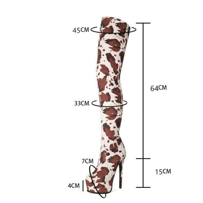 Thigh-high platform boots with a cow print pattern and measurements indicated.