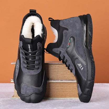 Pair of black and gray winter sneakers with fur lining.