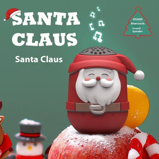 Santa Claus-shaped Bluetooth speaker with a red hat and white beard.