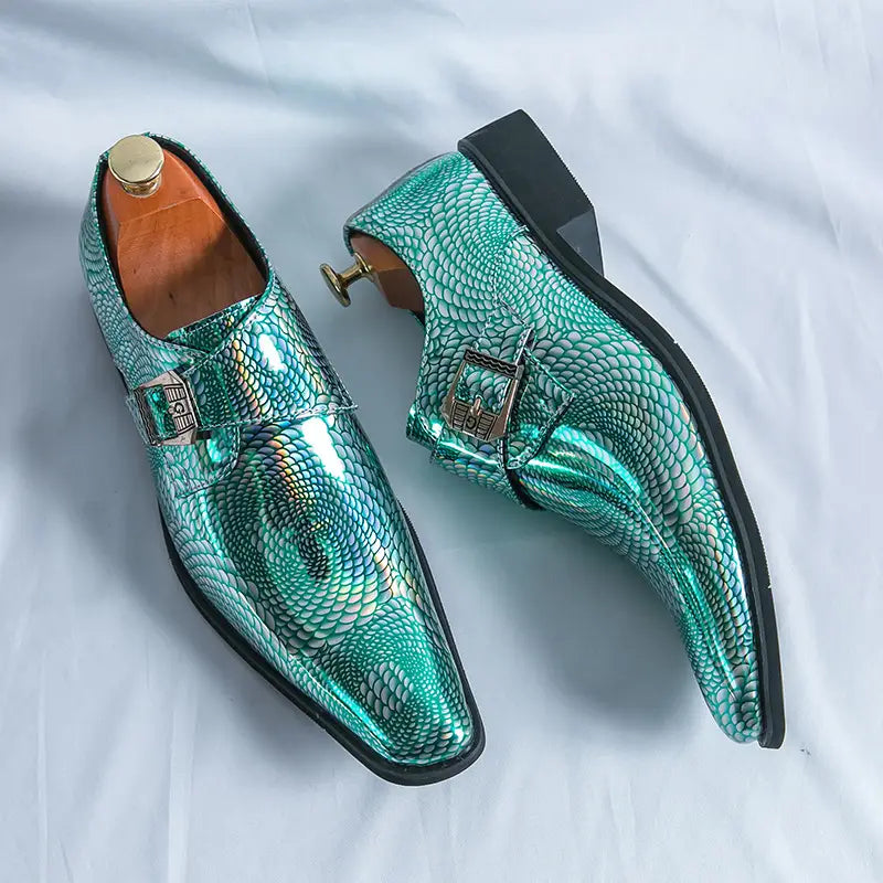 Metallic turquoise dress shoes with snake print and buckle detail for stylish occasions.