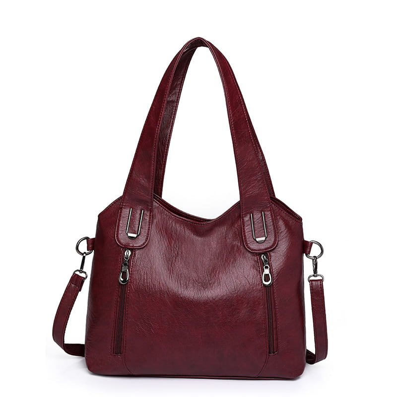 Burgundy leather large capacity handbag with dual zippers and removable strap for women’s fashion.