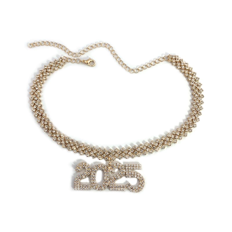 Ornate gold-toned necklace with a ’2023’’ pendant encrusted in rhinestones.