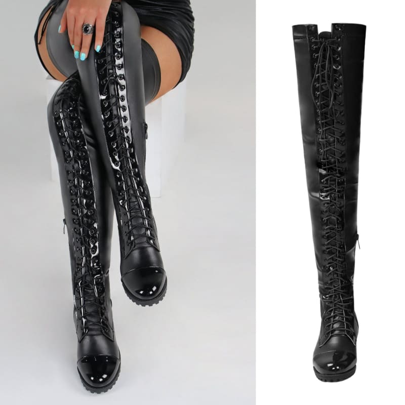 Tall black leather boots with lace-up fronts extending above the knee.