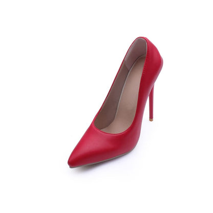 Red high-heeled pump shoe with a pointed toe.