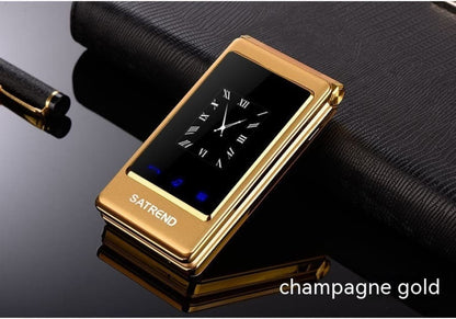 Gold-colored flip phone with a digital clock display on its outer screen.