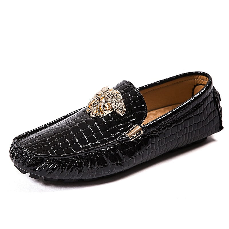 Black crocodile print loafer with gold ornament for stylish mens footwear.