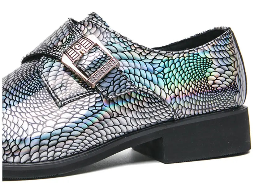 Iridescent patent metallic snake print buckle shoe with chunky black sole.