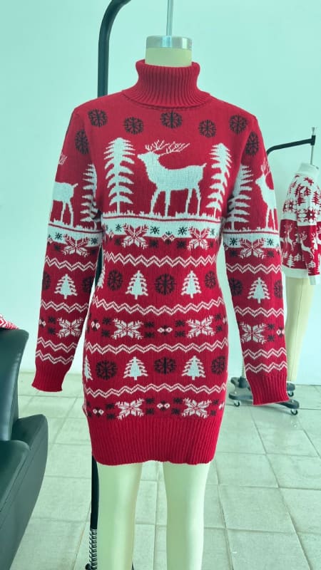 Red and white knitted Christmas sweater dress with reindeer and tree patterns.