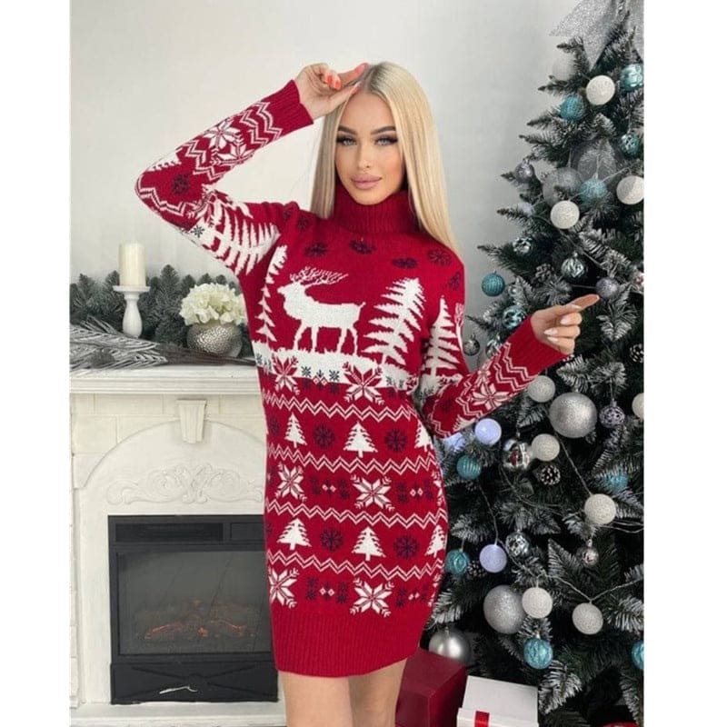 Red and white patterned Christmas sweater dress with reindeer and snowflake motifs.