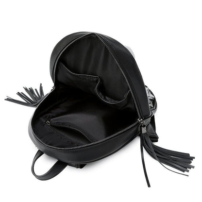 Black leather mini backpack with tassel zipper pull.