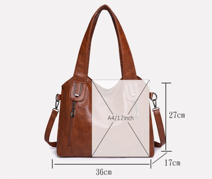 Brown leather large capacity handbag with dual-tone design and shoulder strap for women’s fashion.